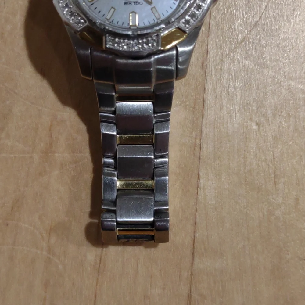 Citizen Eco-Drive silver with gold and rhinestone accents